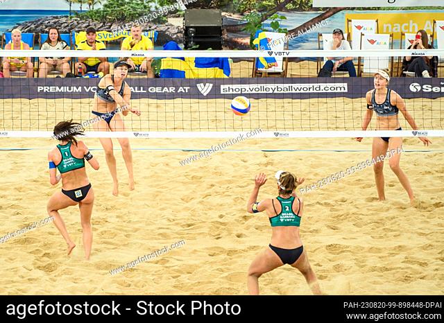 20 August 2023, Hamburg: Volleyball/Beach: Beach Pro Tour, match for 3rd place, Brazil - Germany. Svenja Müller (top left) and Cinja Tillmann (top right) of...