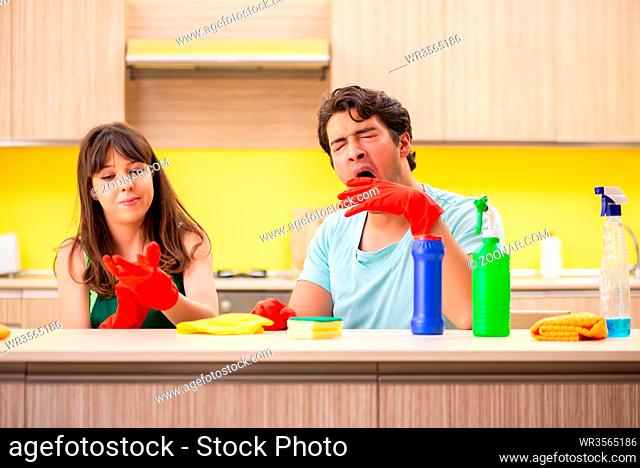 Young couple working at kitchen