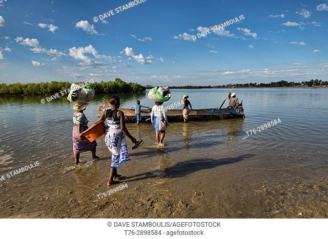 Ferry crossing by pirogue on an inlet off the Indian Ocean, Morondava, Madagascar