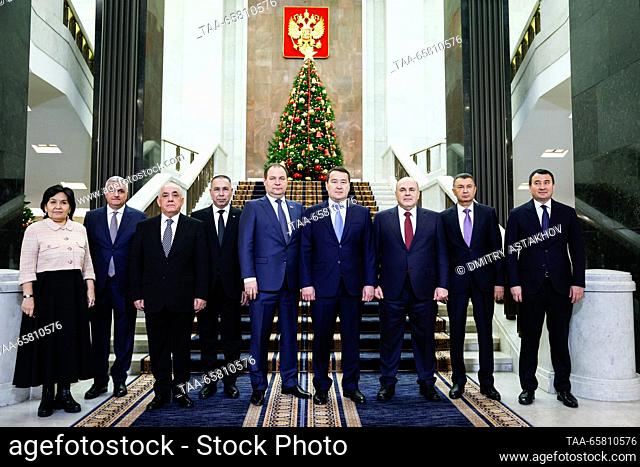 RUSSIA, MOSCOW - DECEMBER 16, 2023: An unidentified member of the Kyrgyzstan delegation, Armenia's Deputy Prime Minister Mher Grigoryan