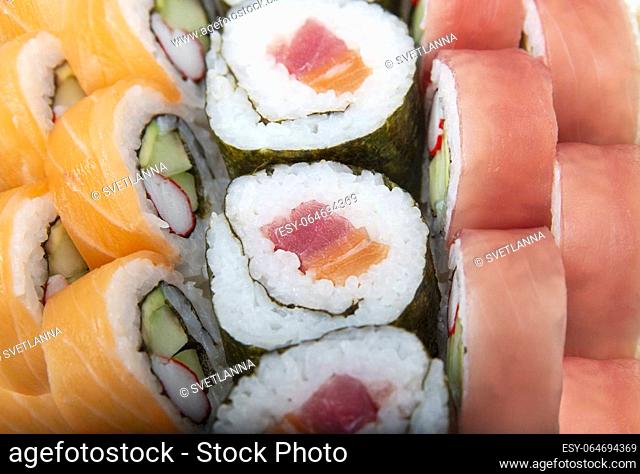 Fresh Sushi rolls with salmon and tuna , close up shot