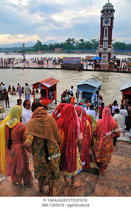 Pilgrims bathing and praying at Har Ki Pairi ghat in the Ganges River