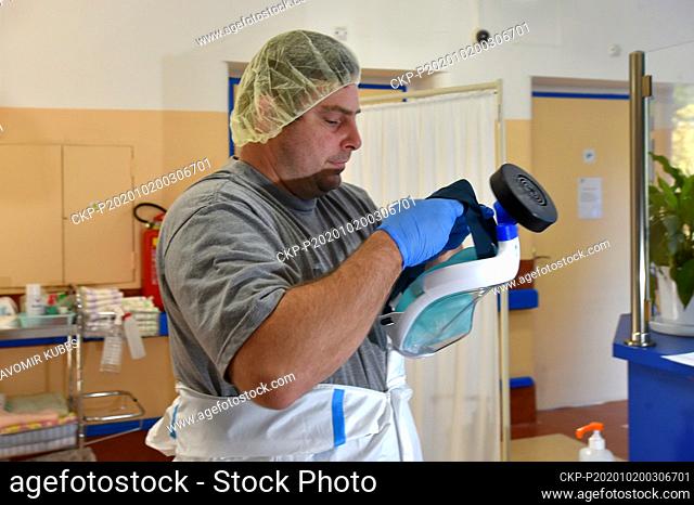 A soldier wears protective clothing in the Rehos follow-up rehabilitation and hospice care facilities in Nejdek, Czech Republic, on October 20, 2020