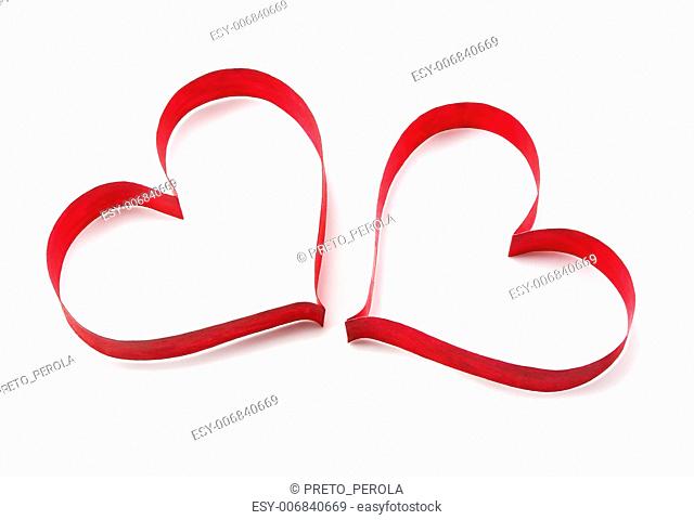 Paper red hearts on white background