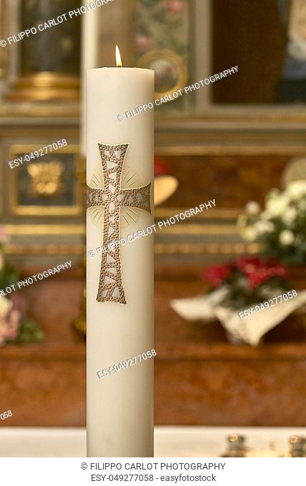 Large lit Easter candle used as a religious object in churches for various types of celebrations