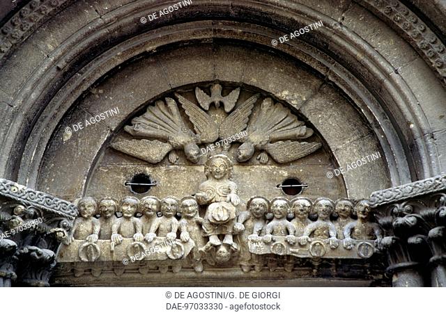 Last Supper with the Holy Spirit and angels in flight, sculptural decoration in the lunette and architrave above the entrance to the Church of St James, Gavi