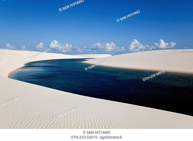 Sandy dunes near Lagoa Bonita Beautiful Lagoon at Parque Nacional dos Lencois Maranhenses, Brazil