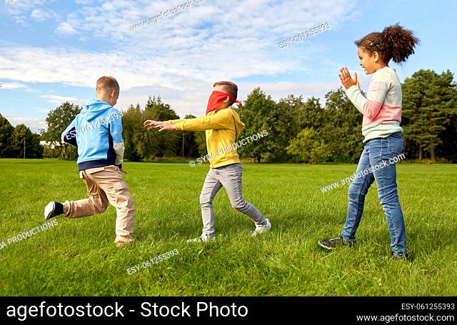 happy children playing and running at park