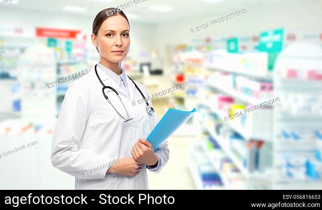 doctor with folder and stethoscope at pharmacy