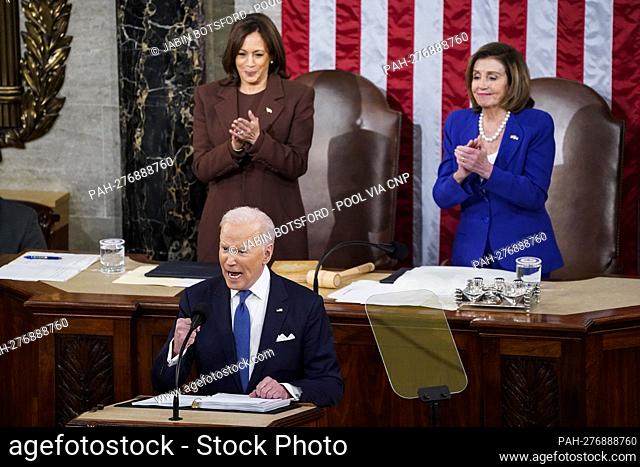 WASHINGTON, DC - MARCH 01: President Joe Biden, flanked by Vice President Kamala Harris and House Speaker Nancy Pelosi (D-Calif