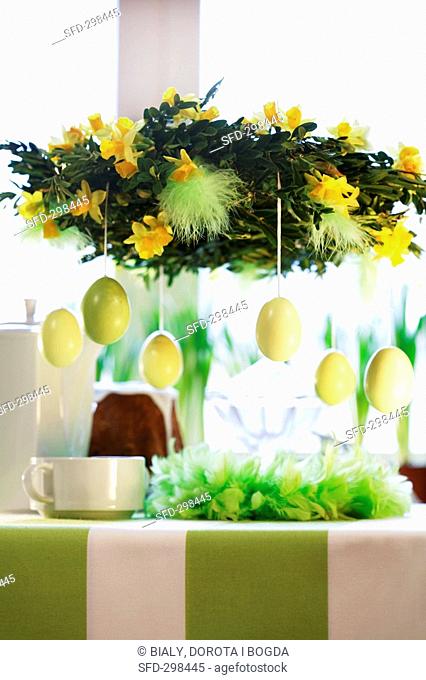 Easter wreath over laid table