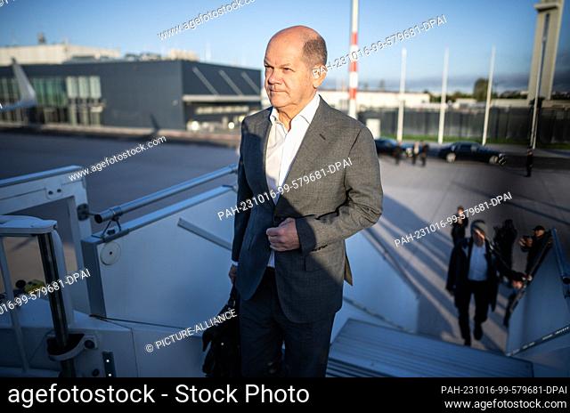 16 October 2023, Berlin: German Chancellor Olaf Scholz (SPD) boards an air force plane to fly to Albania for the Western Balkans summit