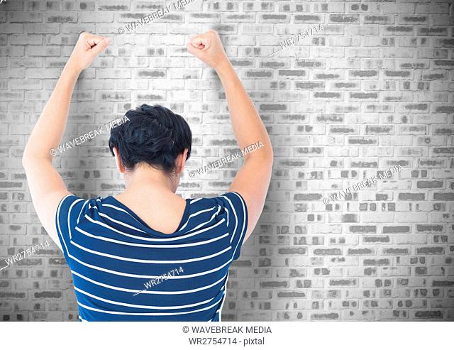 Sad angry woman grief banging fists against a wall