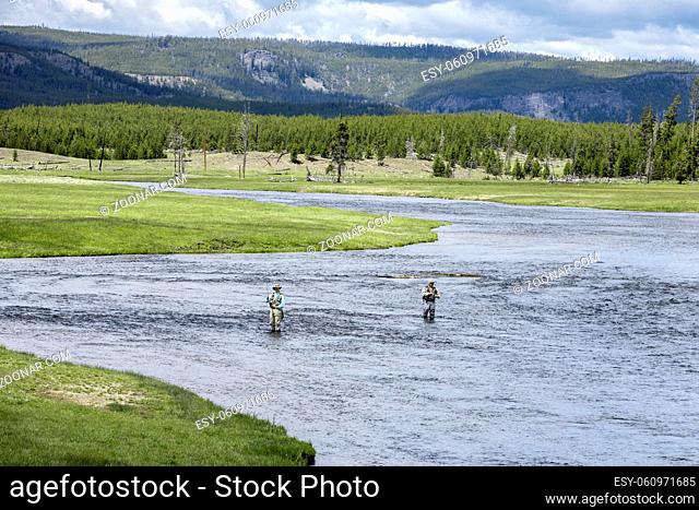 Fly fishermen in the Gibbon River in Yellowstone National Park