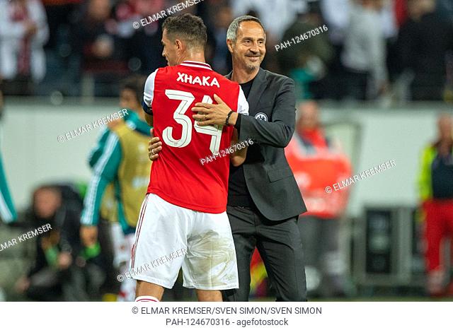 Granit XHAKA (left, ARS) and Adi HUETTER (HÃ-tter, coach, F) hug each other shortly after the game, hug, half figure, half figure, gesture, gesture