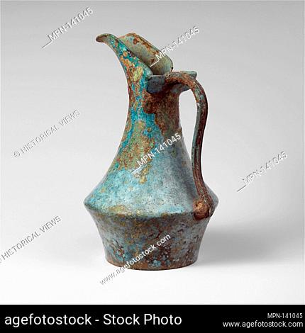 Bronze oinochoe (jug). Period: Classical; Date: early 5th century B.C; Culture: Etruscan; Medium: Bronze; Dimensions: H.: 9 1/4 in. (23