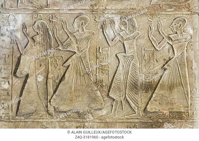Egypt, Cairo, Egyptian Museum, round-topped stela of Any, general of the temple of Amun. Middle register, relatives of Any are praying
