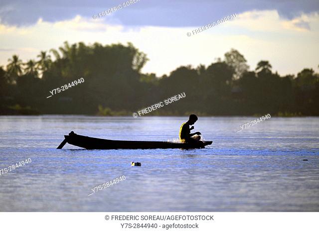Fishing boat on Mekong river, Four Thousand islands, Laos, Southeast Asia