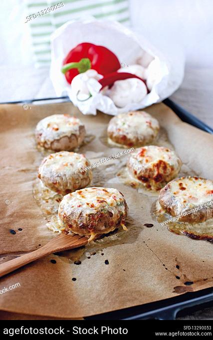 Giant, stuffed mushrooms with mozzarella and melted cheese