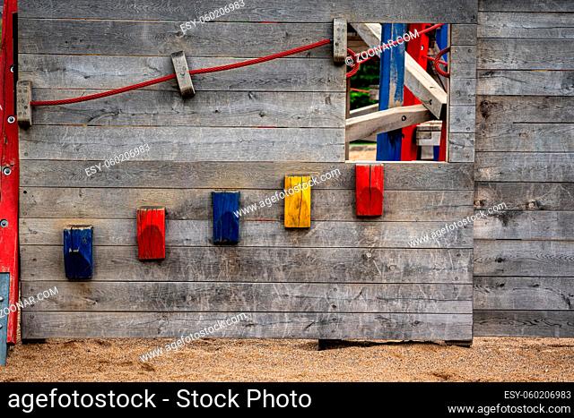 wooden wall with colorful wooden stairs