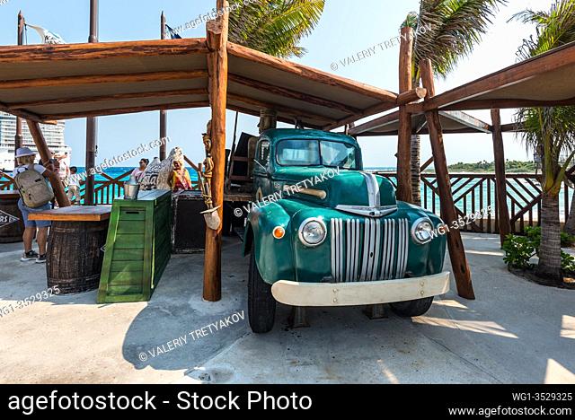 Costa Maya, Mexico - April 26, 2019: Ford pickup truck old car is on the shore of the Costa Maya, Mexico. Today the town is one of Mexican most top tourist...