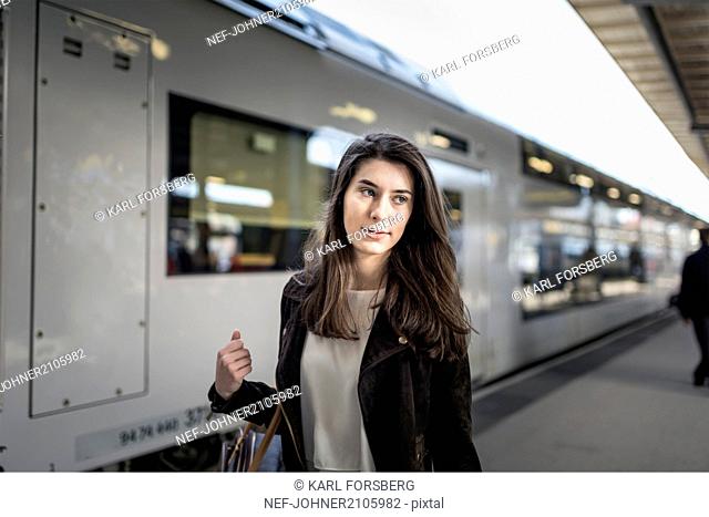 Woman at train station