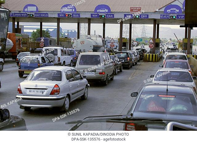 Vehicles lined up on the Mumbai-Pune Expressway at the Toll Counters ; Maharashtra ; India