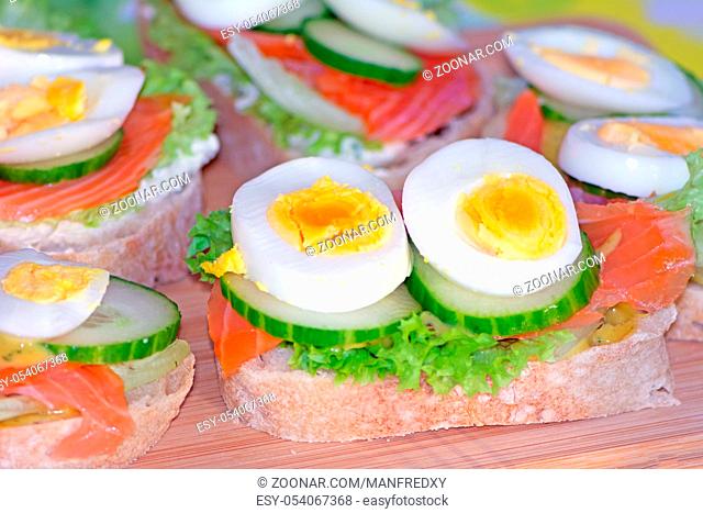 Closeup of a sandwich buffet with salmon and eggs