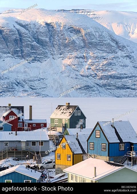 Town Uummannaq during winter in northern Westgreenland beyond the arctic circle. North America, Greenland, Danish territory