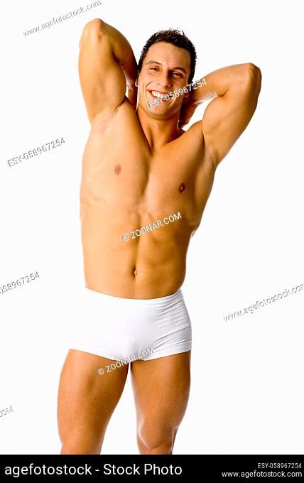 Muscular happy man's standing, flexing his body. Isolated on white in studio