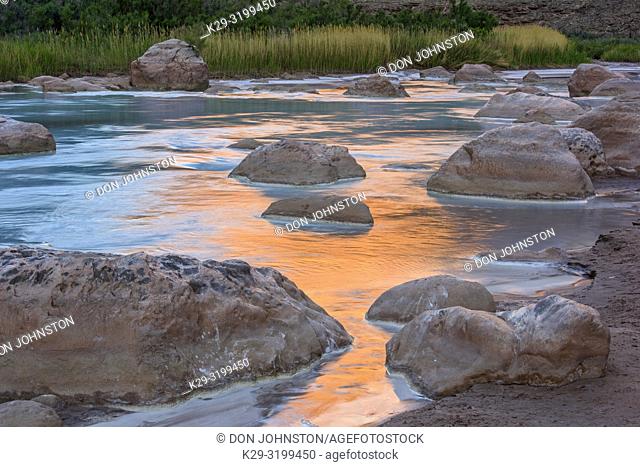 Little Colorado River- mineral-laden water with canyon wall reflections at dawn, Grand Canyon National Park, Arizona, USA