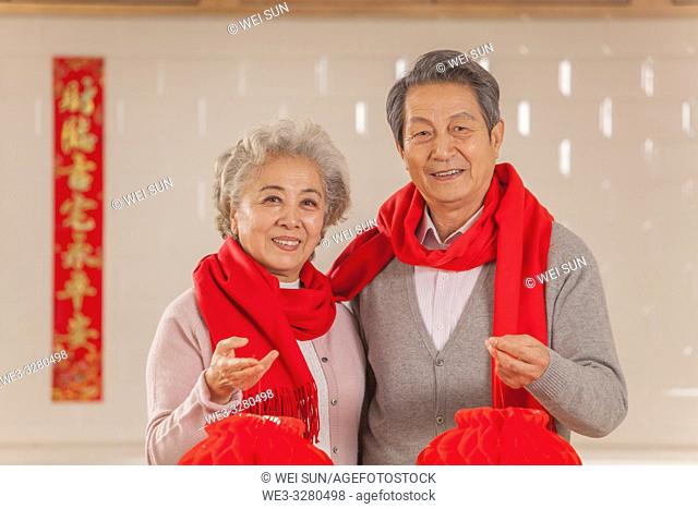 Chinese old couple celebrate the Spring Festival