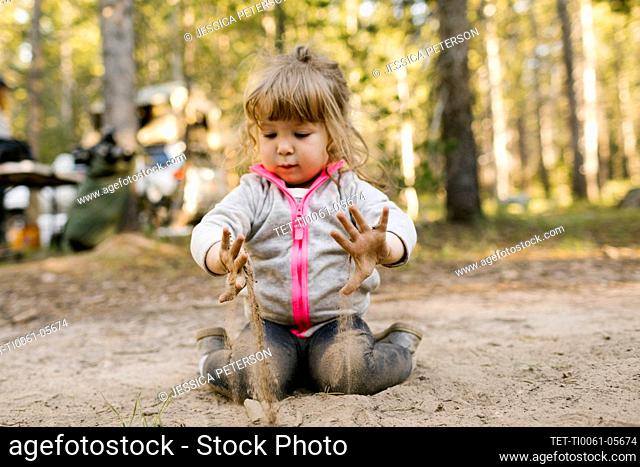 Girl (2-3) playing in sand, Wasatch Cache National Forest