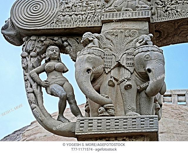A fertility emblem, expressed as the pose of a yakshi, Uttari toran dwar, North gate, Stupa one, Sanchi, Madhya pradesh, India