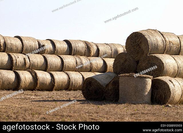 View of a stack of hay bales on the countryside