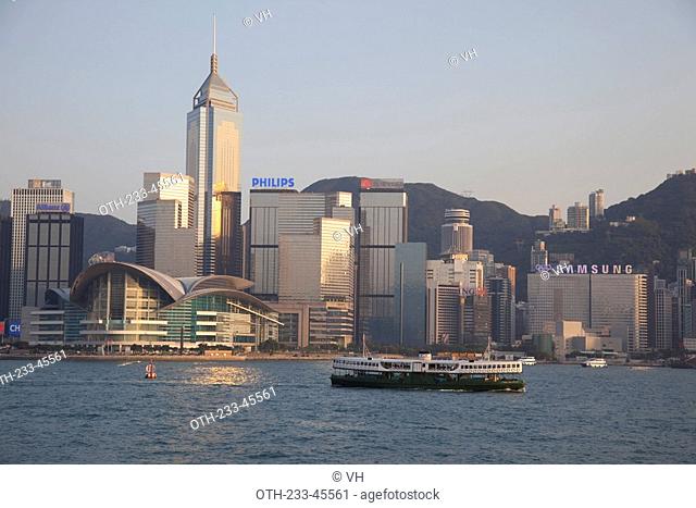 Wanchai skyline from Kowloon with a star ferry in foreground, Hong Kong