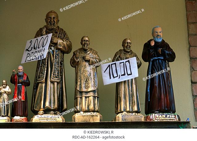 Sale of statues of Padre Pio pilgrimage church Pietrelcina Campania Italy