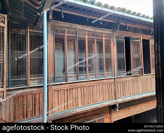 interior of old wooden chinese house or home with carved wood