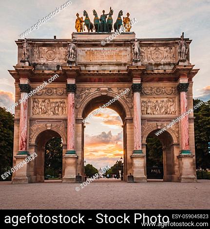 Triumphal Arch of the Tuileries Gardens at sunset in Paris France