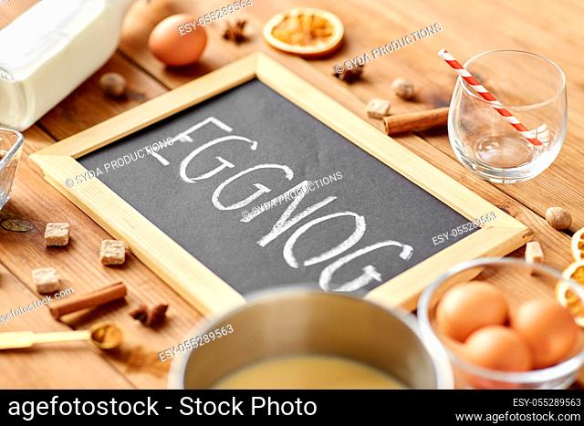eggnog word on chalkboard, ingredients and spices