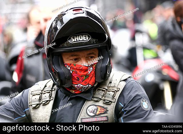 RUSSIA, MOSCOW - OCTOBER 14, 2023: A man arrives at the Sexton Bike Centre for the start of a motorcycle run by the Night Wolves Club to close the season
