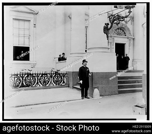 Policeman standing guard at entrance to White House, between 1889 and 1906. Creator: Frances Benjamin Johnston