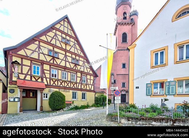Alter Fronhof, restaurant, catholic parish church St. Nikolaus, half-timbering, house facade, village view, Eibelstadt, Franconia, Germany, Europe