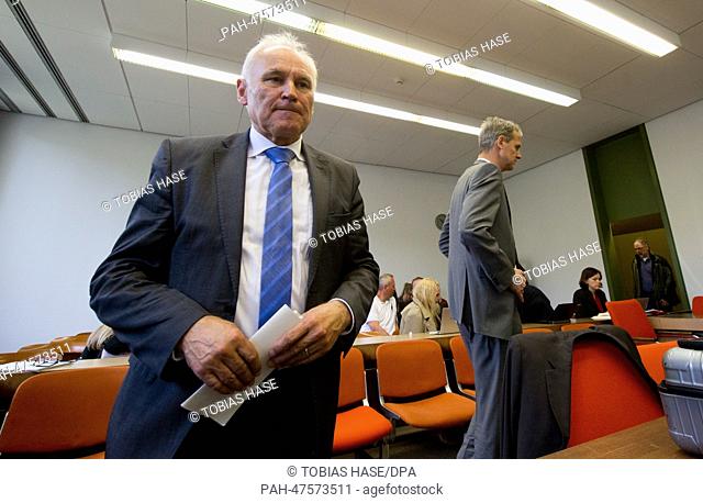 Witness Erwin Huber (CSU, L), former Bavarian Finance Minister, and defendant Michael Kemmer (R), former chairman of Bavarian State Bank BayernLB walk through...