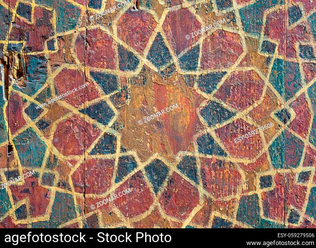 Closeup of ornaments of a wooden cupboard painted with colored geometrical patterns, Sultan al Ghuri Mausoleum, Cairo, Egypt