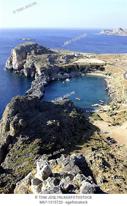 View towards the St Pauls Bay from the Acropolis at Lindos , Rhodes , Dodecanese , Greece