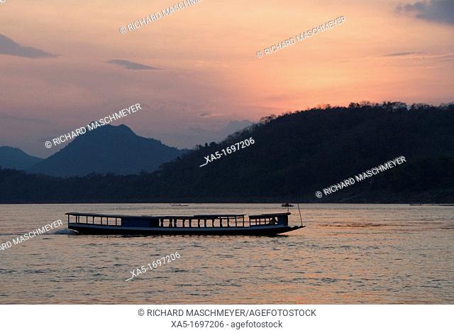 River boat at sunset, Mekong River, Luang Prabang, Laos