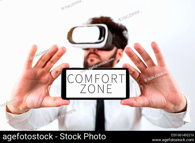 Inspiration showing sign Comfort Zone, Business approach A situation where one feels safe or at ease have Control Man Holding Mobile Phone With Important...
