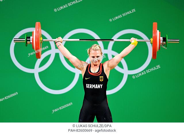 Sabine Kusterer of Germany competes during the Women's 58kg Group B category of the Rio 2016 Olympic Games Weightlifting events at the Riocentro in Rio de...
