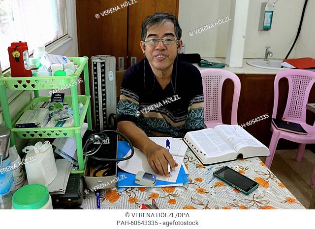 Doctor Chit Pe photographed during a quiet moment aboard the doctor's ship in the Irrawaddy-Delta in Myanmar, 17 June 2015